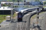 RNCX 1984 leads train P075-22 away from the station